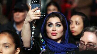 אישה איראנית, אילוסטרציה | EPA/ABEDIN TAHERKENAREH