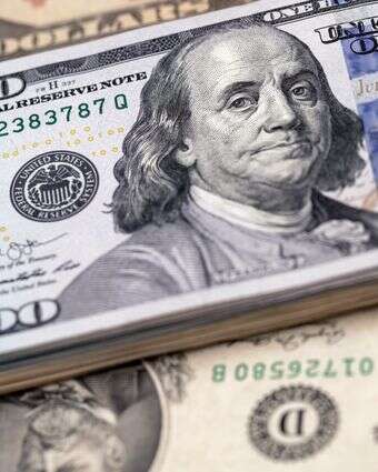 שטרות של מאה דולר אמריקני | צילום: פול יאנג - בלומברג