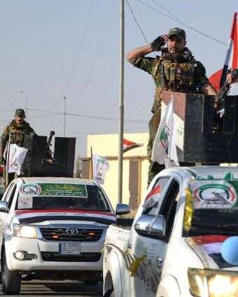 מילציות של "אל־חשד א־שעבי" בעיראק. | AFP מילציות של "אל־חשד א־שעבי" בעיראק. | AFP