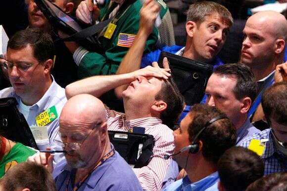 עובדים בבורסה בניו יורק ב-16 בספטמבר יום לאחר נפילת הבורסה | AP