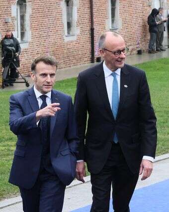 נשיא צרפת מקרון וקנצלר גרמניה מרץ | AP