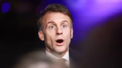 עמנואל מקרון | EPA/OLIVIER HOSLET