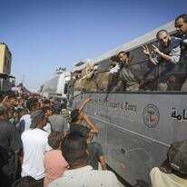 מחבלים משוחררים מגיעים לחאן יונס, באוקטובר | עבד רחים חטיב, פלאש 90