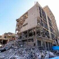 בניין שנפגע מהפצצה בטהרן | ATTA KENARE / AFP