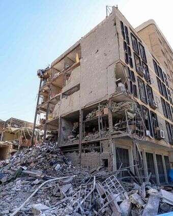 בניין שנפגע מהפצצה בטהרן | ATTA KENARE / AFP