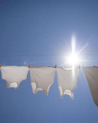 כביסה תלויה על חבל בשכונת נחלאות בירושלים | חיים גולדברג, פלאש 90