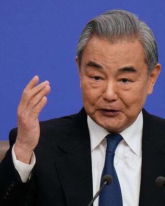 שר החוץ הסיני וואנג יי נואם במהלך מסיבת עיתונאים בשולי כינוס הקונגרס הלאומי העממי (NPC) במרכז התקשורת בבייג'ינג | AP;