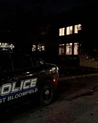 רכב משטרה מחוץ לבית הכנסת במדינת מישיגן בו התרחש הפיגוע | AFP