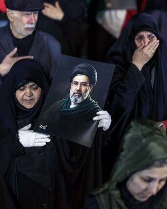 איראנים תומכי משטר בצעדת תמיכה בטהרן | AFP