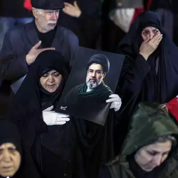איראנים תומכי משטר בצעדת תמיכה בטהרן | AFP