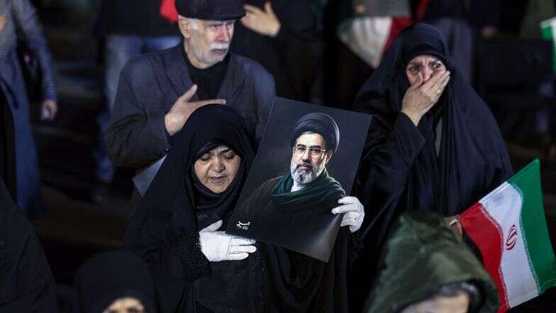 איראנים תומכי משטר בצעדת תמיכה בטהרן | AFP