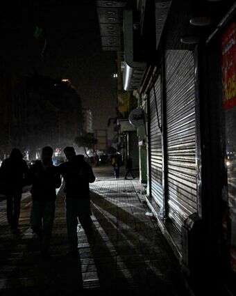 חשיכה ברחובות קהיר | AFP חשיכה ברחובות קהיר | AFP