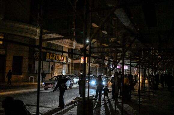 חשיכה ברחובות קהיר | AFP