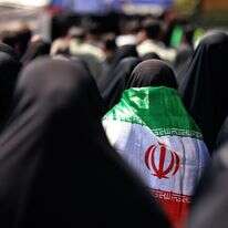 דגל הרפובליקה האסלאמית של איראן | ATTA KENARE / AFP