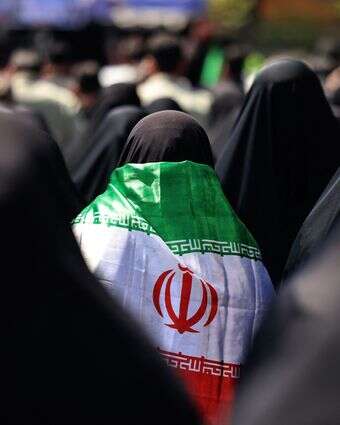 דגל הרפובליקה האסלאמית של איראן | ATTA KENARE / AFP