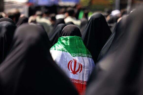 דגל הרפובליקה האסלאמית של איראן | ATTA KENARE / AFP