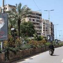 פוסטרים המציגים את המנהיג העליון של איראן, האייתוללה עלי חמינאי | אנואר עמרו / AFP