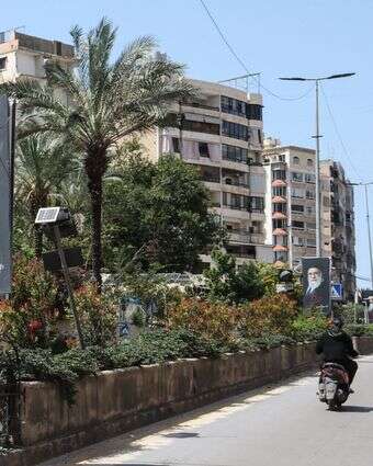 פוסטרים המציגים את המנהיג העליון של איראן, האייתוללה עלי חמינאי | אנואר עמרו / AFP