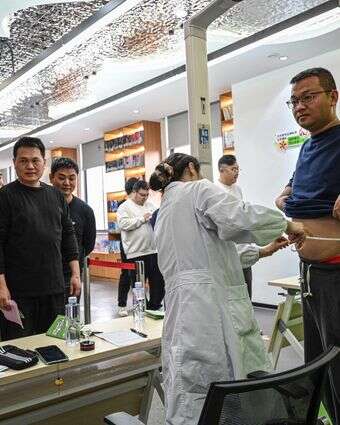 משתתפים בתוכניות לירידה במשקל בסין | AFP