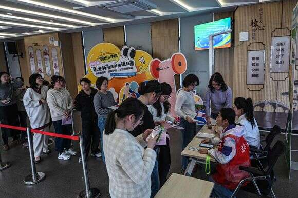 משתתפים בתוכניות לירידה במשקל בסין | AFP