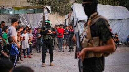 מחבלי חמאס לצד תושבי רצועת עזה | עלי חסן, פלאש 90