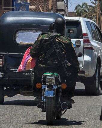 חייל סודאני ברחובות חרטום | AFP
