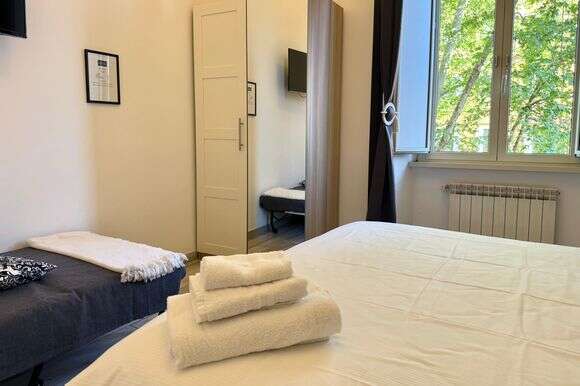 "החדר המשולש הקלאסי" בבית ההארחה Lazy Gio דרך Booking.com | טלי קומפטון / הוושינגטון פוסט "החדר המשולש הקלאסי" בבית ההארחה Lazy Gio דרך Booking.com | טלי קומפטון / הוושינגטון פוסט