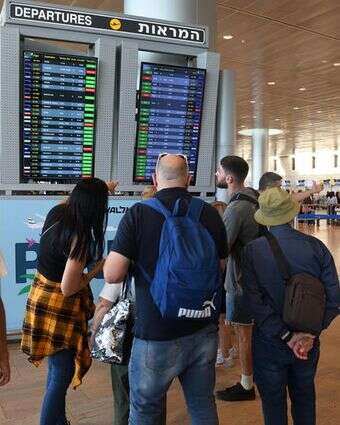 נוסעים בנמל התעופה הבין-לאומי בן-גוריון | גילי יערי/Flash90