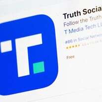 מסך ההורדה של האפליקציה Truth Social מוצג על גבי מחשב נייד | AP מסך ההורדה של האפליקציה Truth Social מוצג על גבי מחשב נייד | AP
