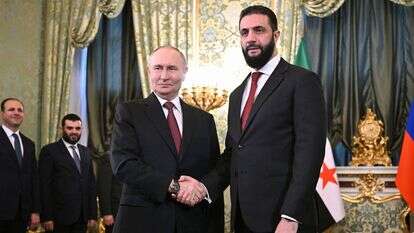 פוטין וא-שרע, ארכיון | KREMLIN PRESS OFFICE via Getty Images