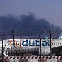 מטוס של חברת "פליי-דובאי" (FlyDubai) חונה בנמל התעופה הבינלאומי של דובאי | AP