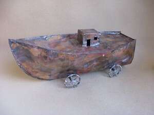 משכן על גלגלים. יונתן אופק, נחושת, 2009 משכן על גלגלים. יונתן אופק, נחושת, 2009