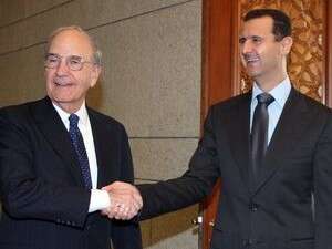 בשאר אסד עם השליח האמריקאי ג'ורג' מיטשל. בשאר אסד עם השליח האמריקאי ג'ורג' מיטשל.