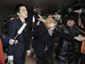 המיסיונר רוברט פארק בנמל התעופה בביג'ינג לאחר השחרור המיסיונר רוברט פארק בנמל התעופה בביג'ינג לאחר השחרור