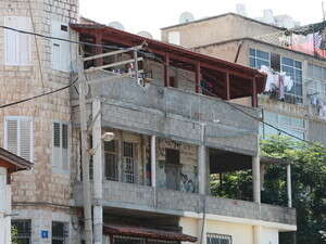 הבניין שממנו הושלך הנער, לפי החשד. הבניין שממנו הושלך הנער, לפי החשד.