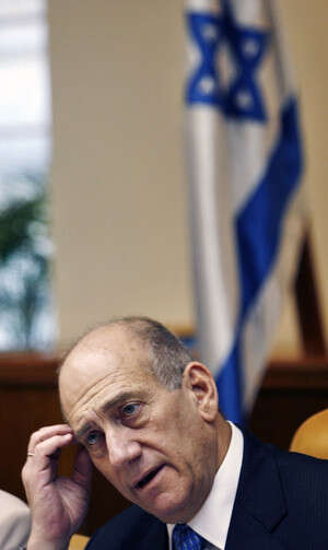אולמרט, יודע עם מי יש לו עסק. צילום: אי-אף-פי אולמרט, יודע עם מי יש לו עסק. צילום: אי-אף-פי