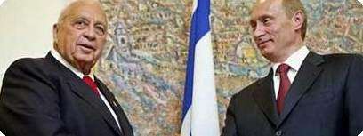 ולדימיר פוטין ואריאל שרון, היום.
צילום: אי-פי