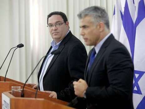 בניגוד לקו המפלגתי. השרים שי פירון ויאיר לפיד בניגוד לקו המפלגתי. השרים שי פירון ויאיר לפיד