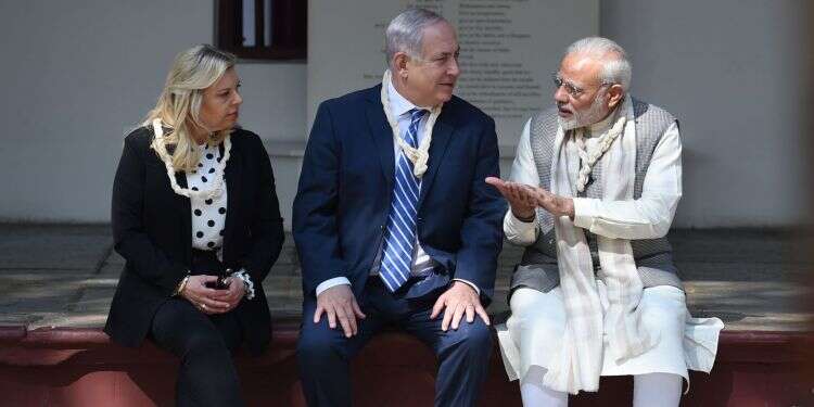 מודי ובני הזוג נתניהו. צילום: AFP צילום: AFP