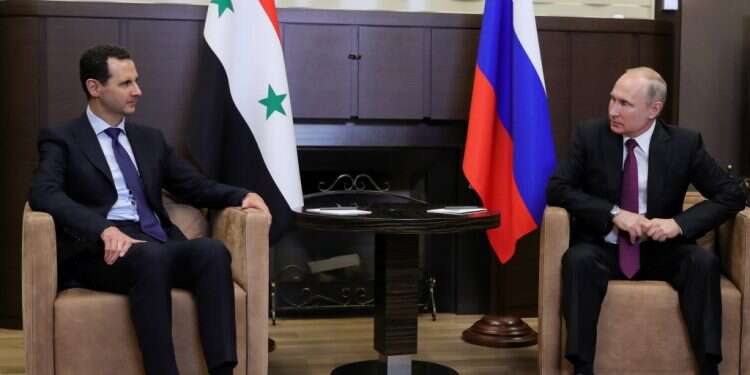 ולדימיר פוטין ובשאר אל אסד. צילום: EPA צילום: EPA