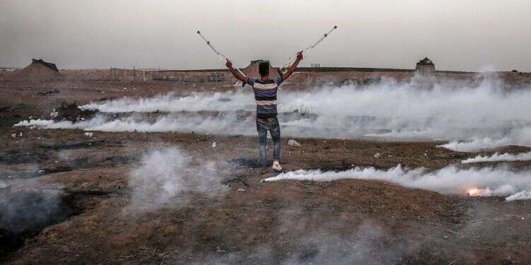 הפגנה על הגדר בעזה. צילום: EPA צילום: EPA