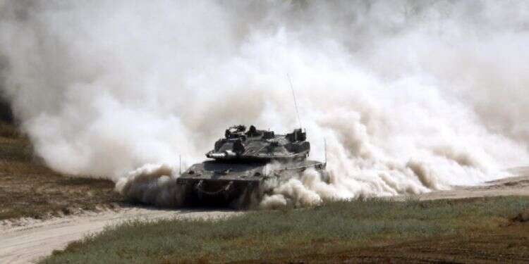 טנק בגבול רצועת עזה. צילום: AFP צילום: AFP