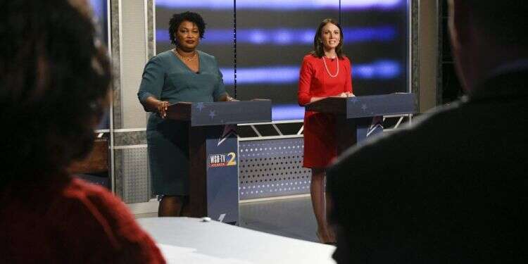 סטייסי אברמס (משמאל) וסטייסי אוונס בעימות. צילום: AP צילום: AP