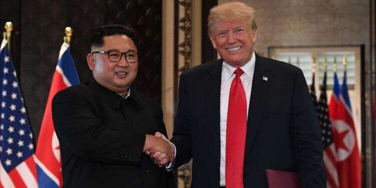 טראמפ וקים. צילום: AFP צילום: AFP