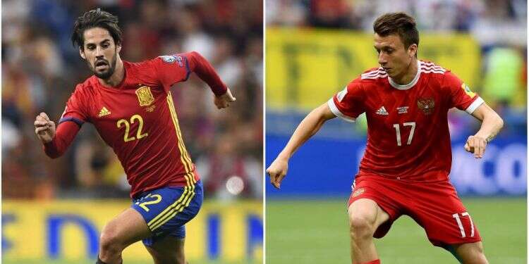 אלכסנדר גולובין מרוסיה ואיסקו מספרד. צילום: AFP צילום: AFP