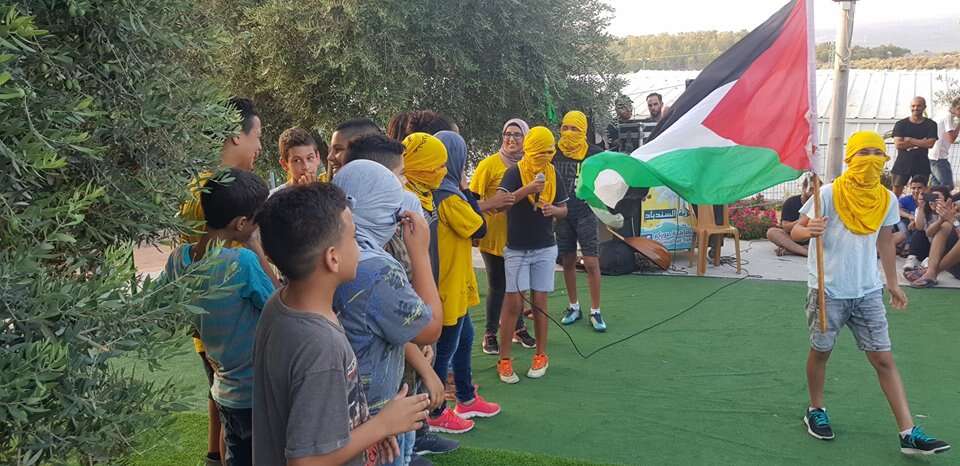 ילדים פלסטינים רעולי פנים. מתוך עמוד הפייסבוק של אבנאא אל-בלד