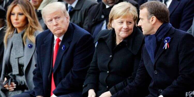 דונלד ומלניה טראמפ, אנגלה מרקל ועמנואל מקרון בטקס לציון סוף מלחמת העולם הראשונה. צילום: AFP צילום: AFP
