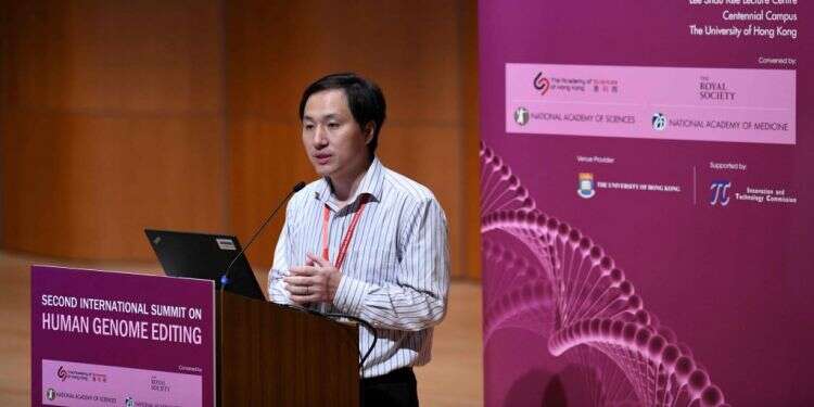 הו ז'יאנקואי בהרצאתו צילום: AFP צילום: AFP