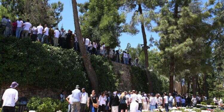 יום הזיכרון בהר הרצל. צילום: מרים צחי צילום: מרים צחי