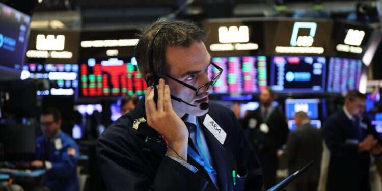 התנודות שם משפיעות על חיינו כאן. הבורסה בניו־יורק. צילום: AFP צילום: AFP